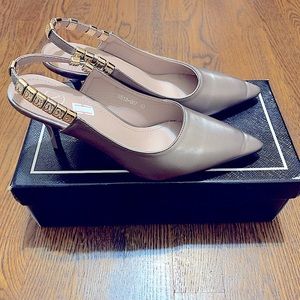 Beautiful embellished sling back heels.